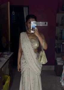 Elegant Beige Embellished Saree