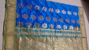 Vibrant Blue Saree with Floral Motif