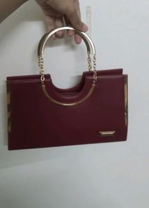 Elegant Burgundy Clutch Bag