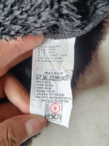 Brand is EXTCozy Black Fleece Hoodie Jacket OG