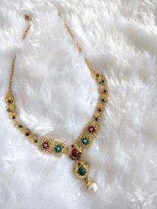 Elegant Gold Necklace with Red & Green Stones