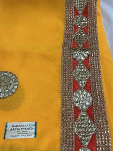 Vibrant Yellow Embellished Saree