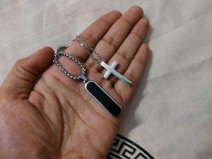 Black Pendant and Silver Cross Charm