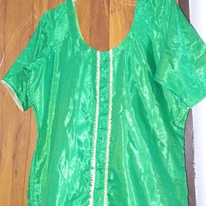 Green silk color kutra with lace in front. perfect for mending functions.  custom made..size 42.never worn