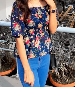 Cute Navy Floral Smocked Peplum Top