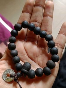 Black Bead Bracelet with Coin Charm