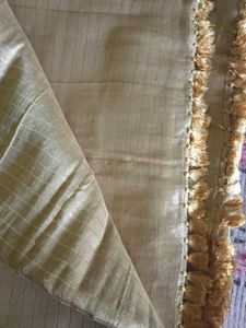 Elegant Gold Striped Fabric with Tassel Trim