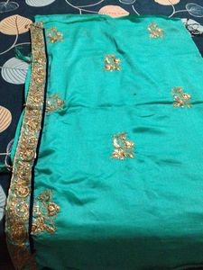 Elegant Teal Saree with Gold Embroidery
