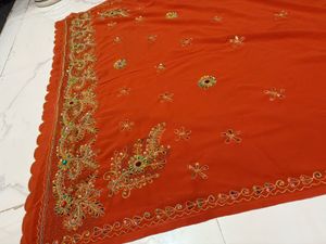 Embroidered rust  Orange Saree