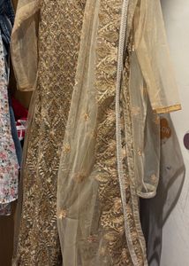Elegant Embroidered Ethnic Gown with bead stones