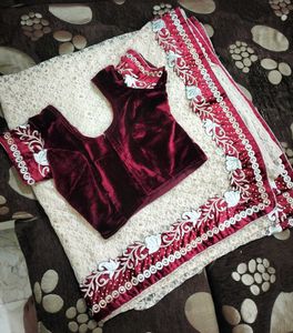 Designer Saree With Red Velvet Blouse And Border