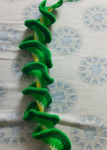 Crocheted hand warmer and spiral