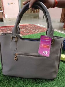 Stylish Gray Handbag with Teddy Charm