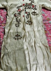 Elegant Beige Kurta with Red Accents
