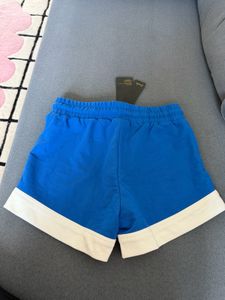 Brand new Blue Athletic Shorts with White Trim