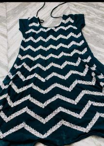 Beautiful Teal Saree with White Embellishments