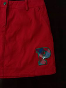 Red Mini Skirt with 'P' Emblem