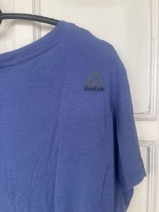 Reebok light purple T-Shirt with Silver Grid Print