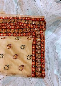Elegant Beige Embroidered Saree