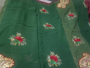 Elegant Green Embroidered pure Georgette Saree