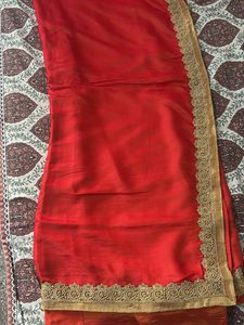 Elegant Red Saree with Golden Lace