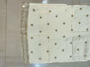 Embroidered Cream Silk Straight Kurta Pant Set.