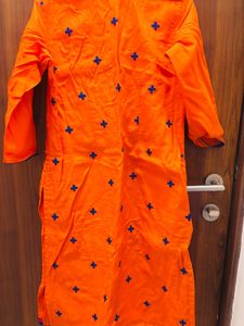 Vibrant Orange Kurta Set with Peacock Embroidery