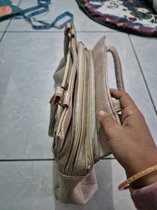 Elegant Grey Handbag with Gold Accents