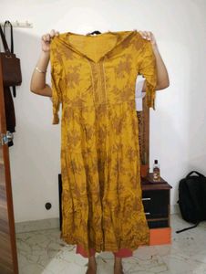 A mustard yellow anarkali kurta