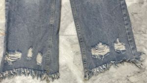 Distressed Wide Leg Jeans with Fringed Hem