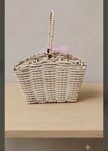 Charming Woven Basket with Pink Bow