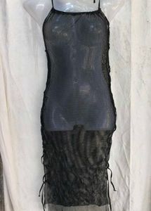 69. Black sheer bodycon
