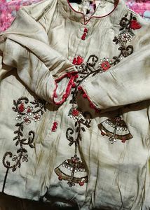 Elegant Beige Kurta with Red Accents