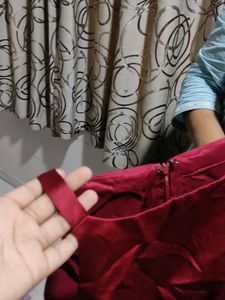 A Maroon Colour Gown