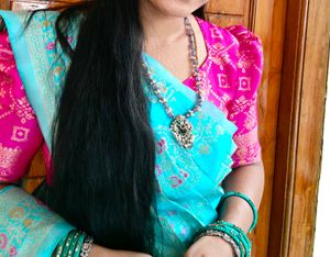 pink blouse blue saree