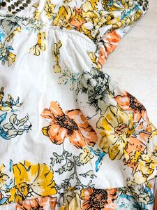 Floral top with Embellished Neckline