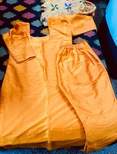 Musturd colour suit with fulkari dupatta