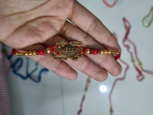 veera oxidised gold brooch rakhi
