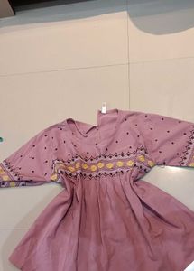 Embroidered Peplum Top
