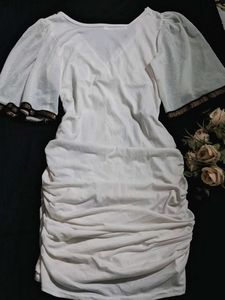 white ruched mini dress.