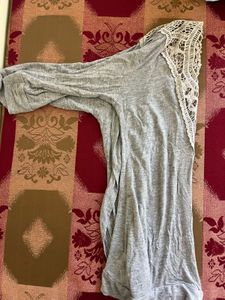 Gray long sleeve top with crochet detail
