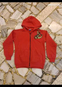 23. Red Zip-Up Hoodie with Paisley Design
