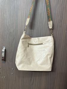 Stylish Beige Hobo Bag with Boho Strap