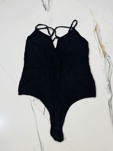 Black Ribbed Criss-Cross Bodysuit
