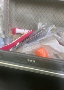 A Makeup Box Filled With Random