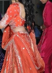 Stunning Red &amp; Gold Embellished Lehenga Choli