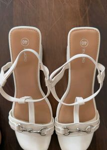 Elegant White heels with Detail