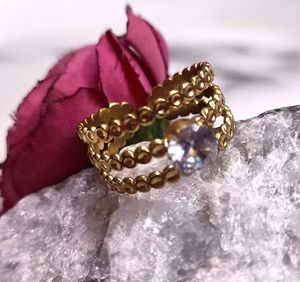 Elegant Gold Ring with Crystal