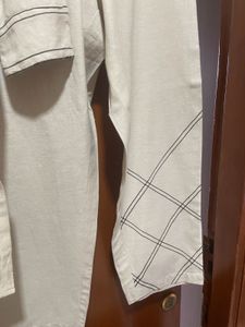 Elegant Beige Kurta Set with Black embroidery