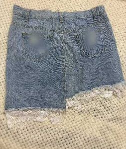 Distressed Denim Mini Skirt with Lace Trim